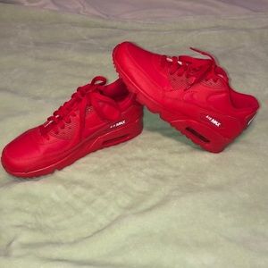 Red Nike Air Max shoes .
